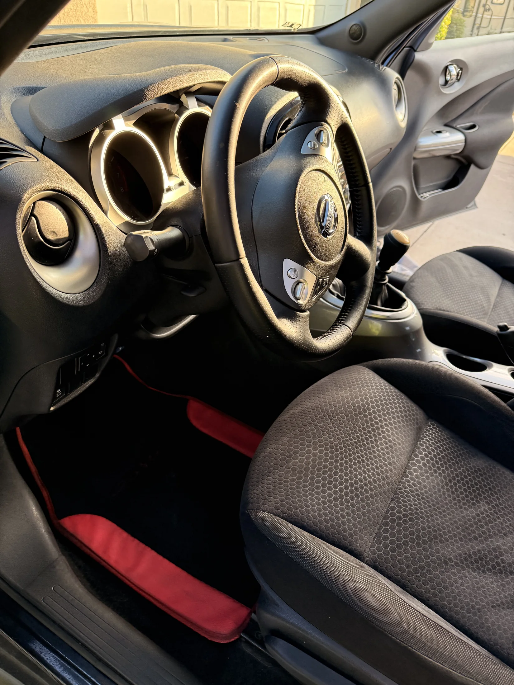 Nissan steering wheel and driver area after interior detailing